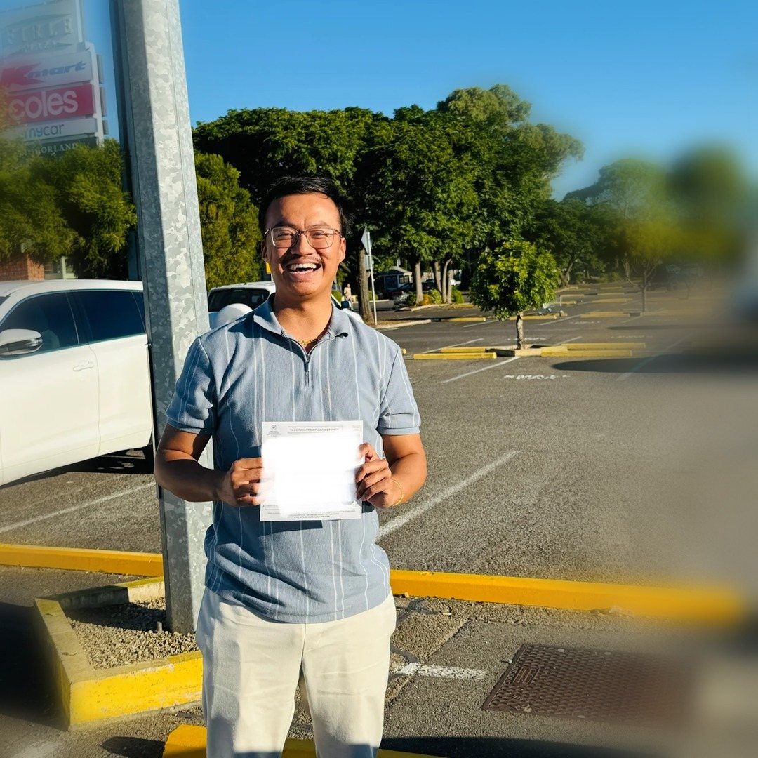 Karlosh with his Certificate of Competency